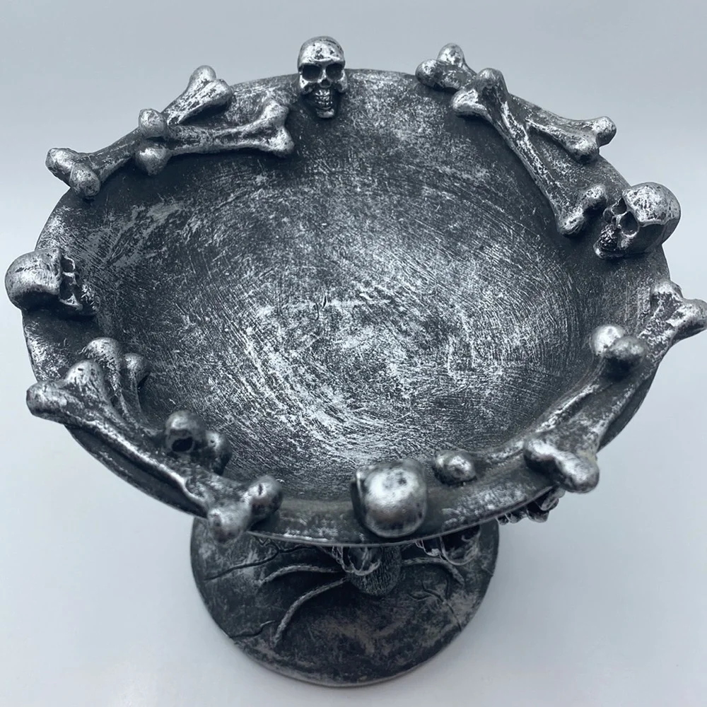 Halloween decorative skulls bones and spider chalice